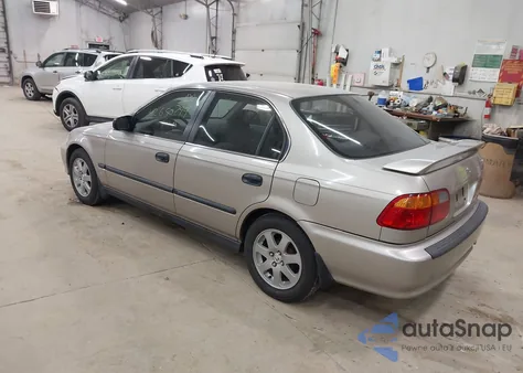 2000 Honda Civic Lx from USA, damaged, VIN 1HGEJ6674YL063592